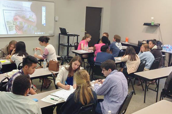 Denison University Social Entrepreneurship Workshop students creating business plans at ECDI